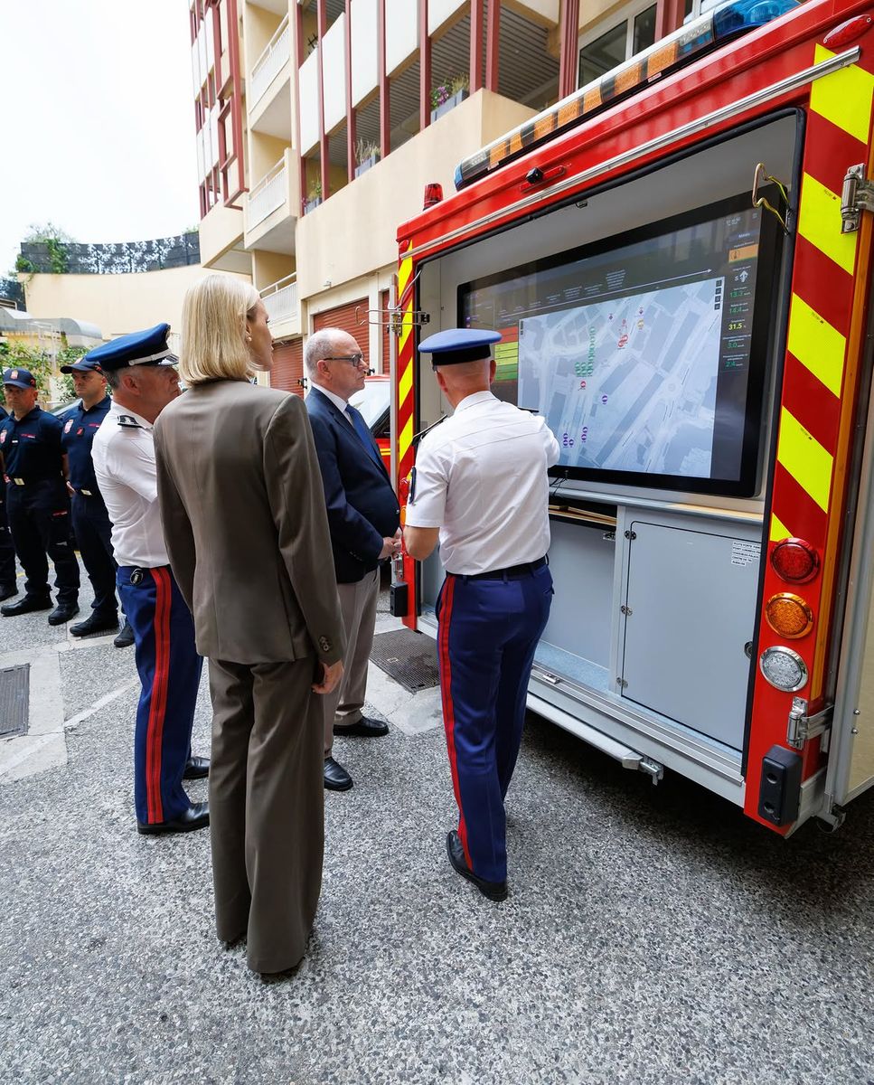 Princess Charlene opted for modern tailoring with a double-breasted blazer, wide-leg trousers, and a crisp white shirt.
