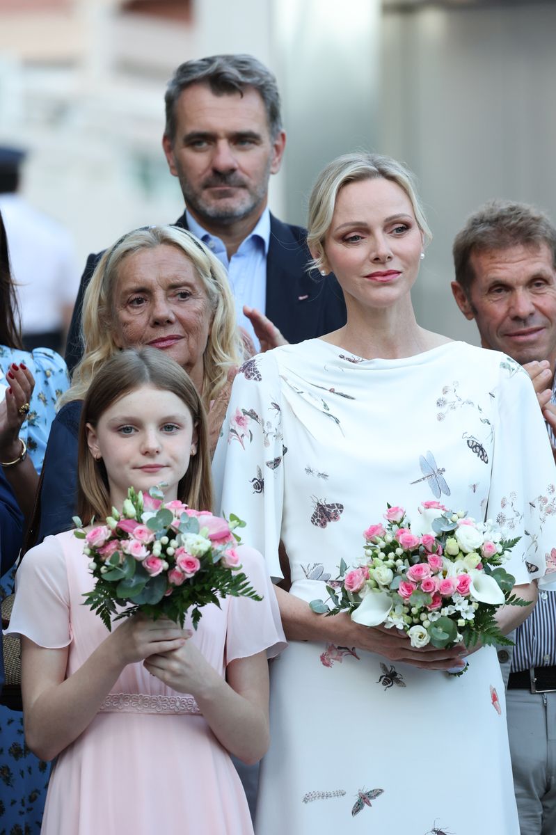 Princess Charlene wore a whimsical Erdem midi dress featuring botanical motifs, butterflies, bees and dragonflies for the family outing in Monaco.
