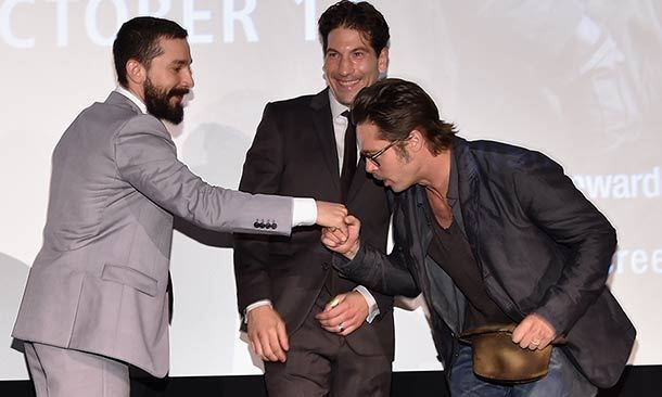 Brad Pitt jokes around with co-star Shia LaBeouf at the New York premiere of Fury.