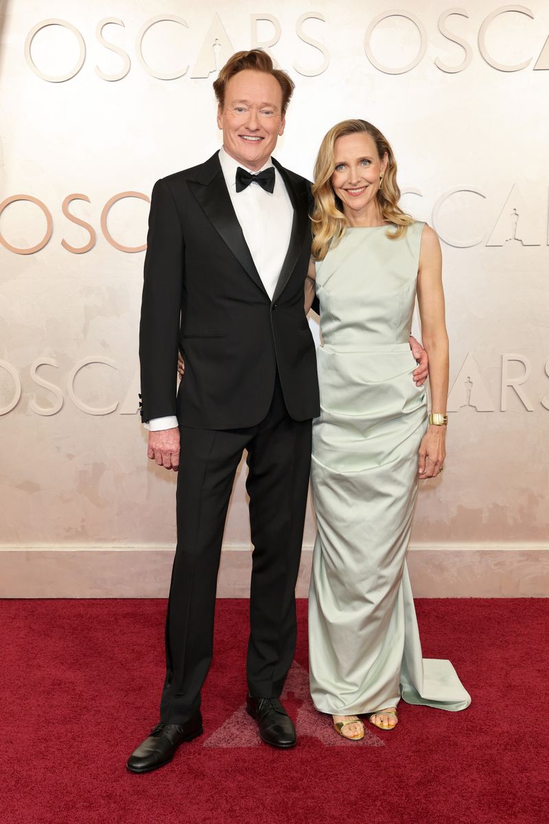 HOLLYWOOD, CALIFORNIA - MARCH 02: (L-R) Conan O'Brien and Liza Powel O'Brien attend the 97th Annual Oscars at Dolby Theatre on March 02, 2025 in Hollywood, California. (Photo by Frazer Harrison/WireImage) 