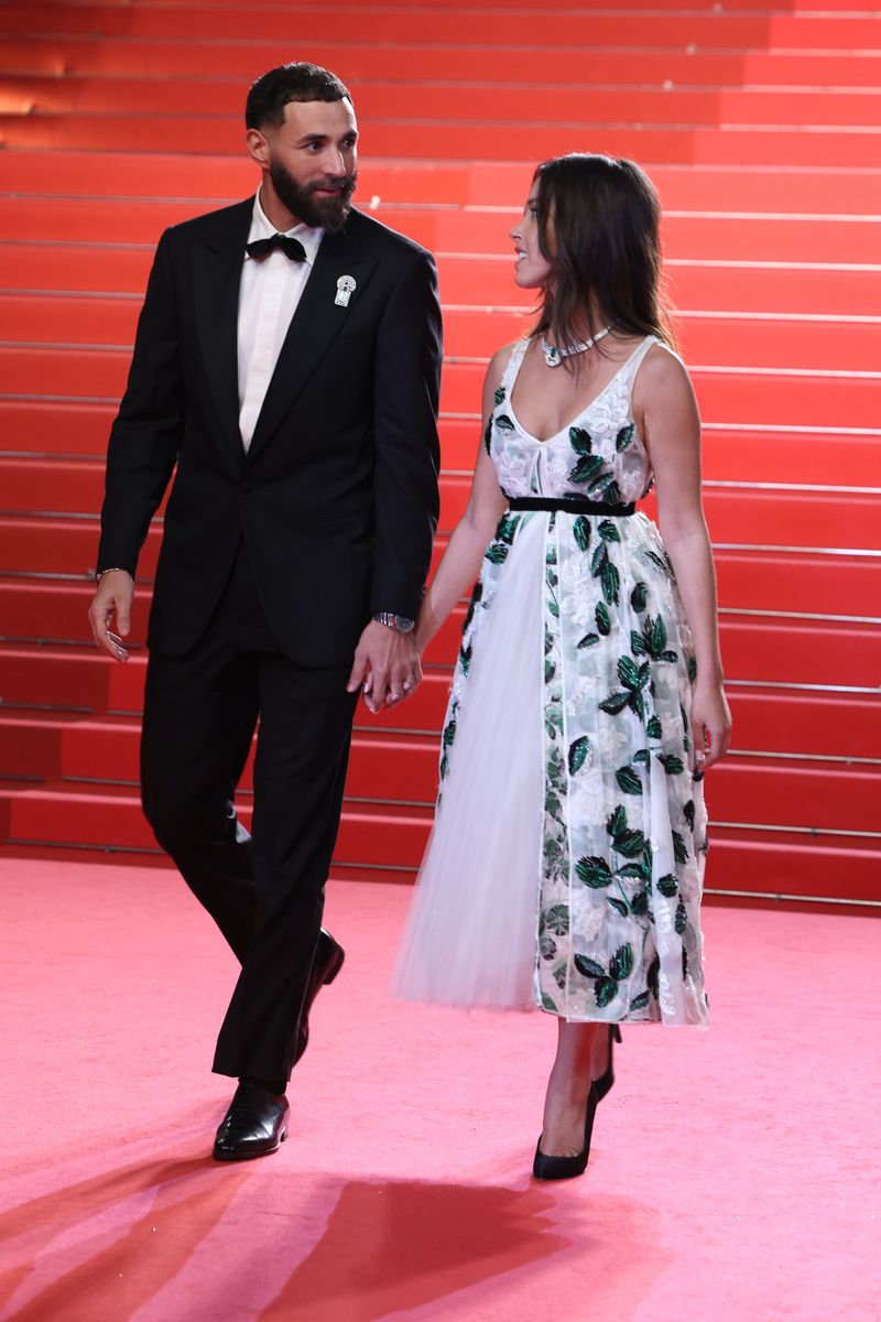 CANNES, FRANCE - MAY 23:  Karim Benzema and Lyna Khoudri depart the "13 Jours 13 Nuits" red carpet at the 78th annual Cannes Film Festival at Palais des Festivals on May 23, 2025 in Cannes, France.  (Photo by Pascal Le Segretain/Getty Images)