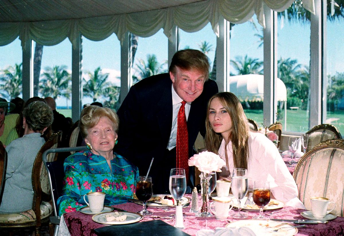 Late American socialite Mary Trump, Donald Trump, and Melania Trump as they pose together in the tea house of the Mar-a-Lago club, Palm Beach, Florida, February 27, 2000.