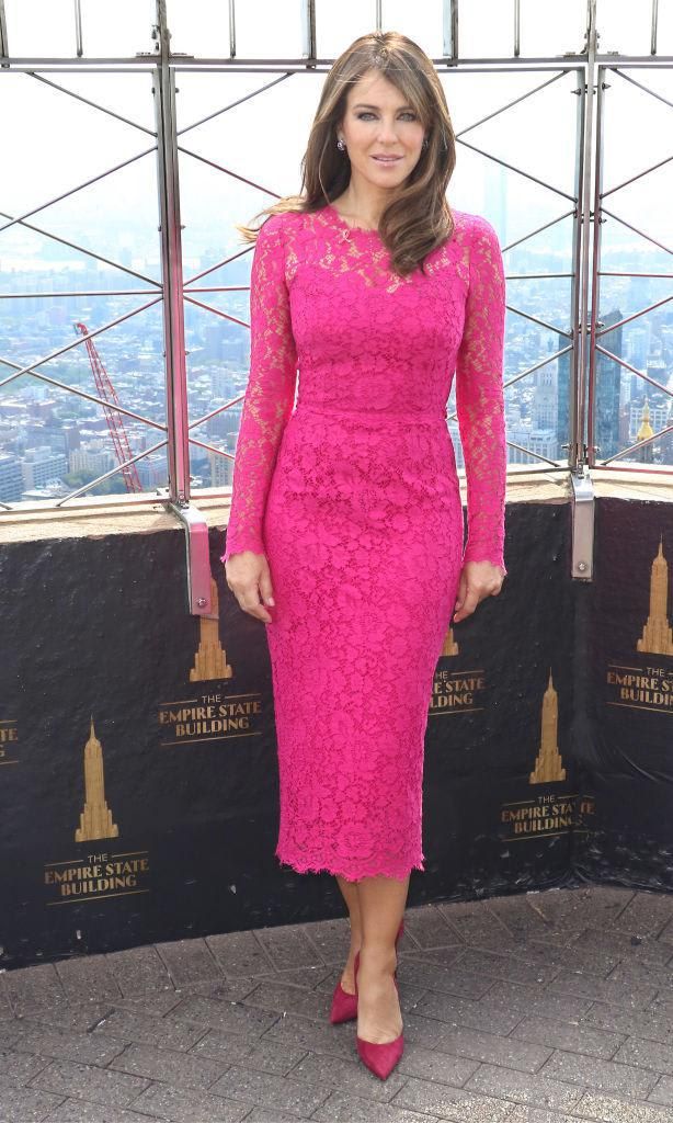 Elizabeth Hurley in a fuchsia lace dress