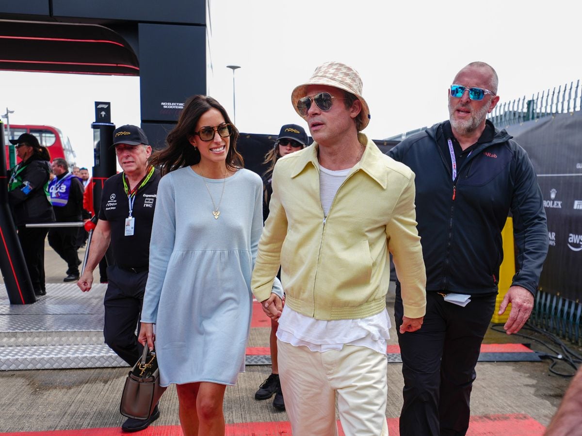 Brad Pitt arrives at the British Grand Prix Formula One at Silverstone with his girlfriend Ines De Ramon. 
