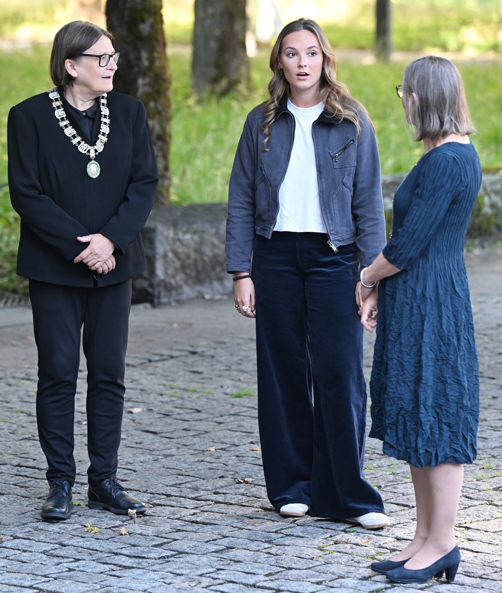 Princess Ingrid Alexandra is welcomed by university officials in Oslo.