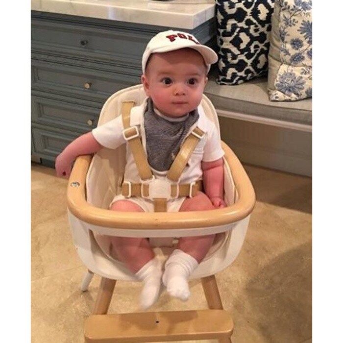 Sitting <i>The-adorably</i>. Theodore sat perched up wearing a baseball cap to try out his highchair. Ivanka captioned the sweet photo, "Theodore is taking his highchair for a test drive!"
Photo: Instagram/@ivankatrump