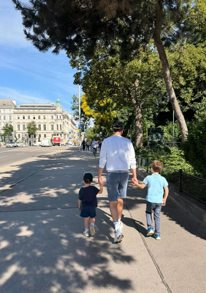 Jack Brooksbank walks hand in hand with sons August and Ernest, who are now proud big brothers to the couple's first daughter.