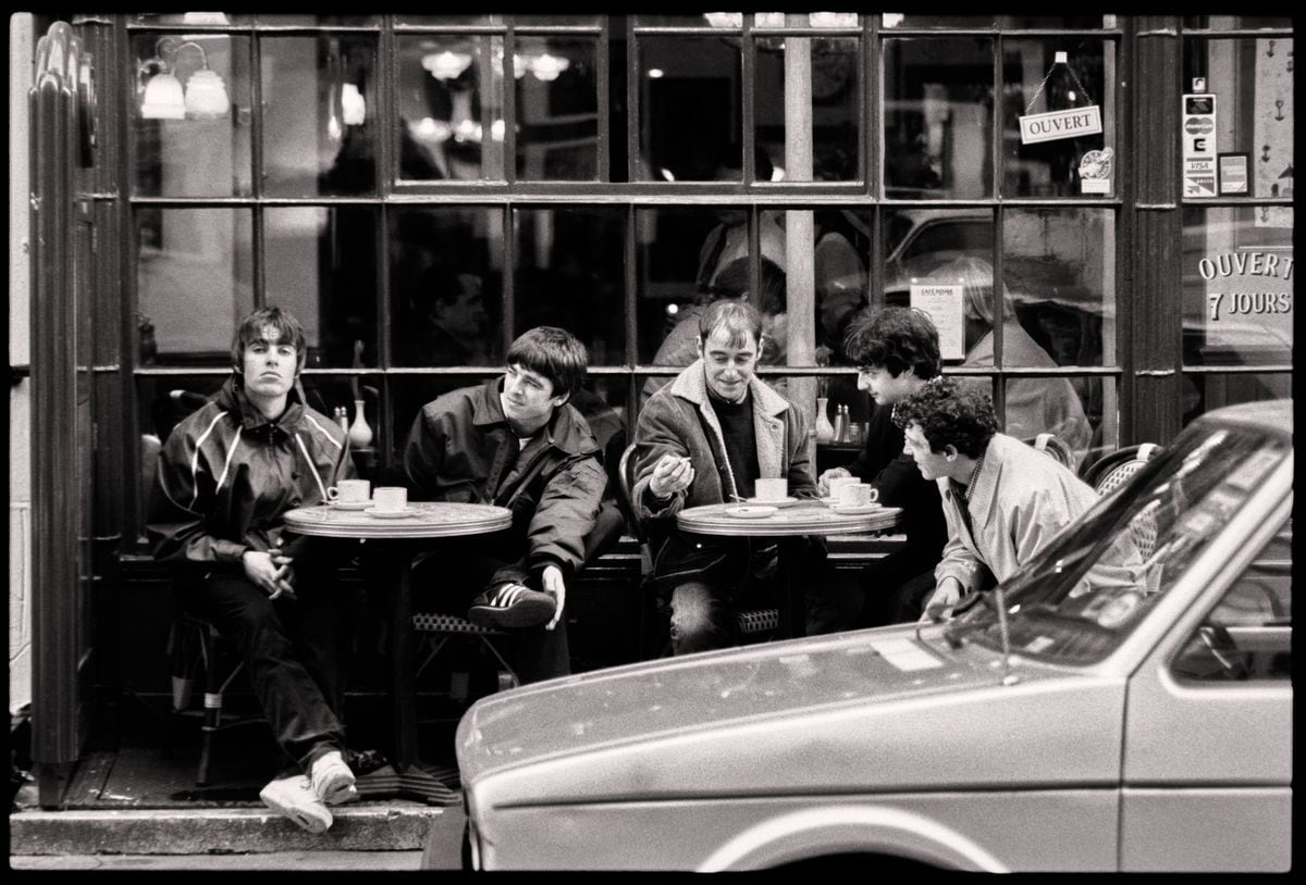 British rock band Oasis (Noel Gallagher, Liam Gallagher, Paul McGuigan, Paul Arthurs, Tony McCarroll) in Soho, London, 15 March 1994
