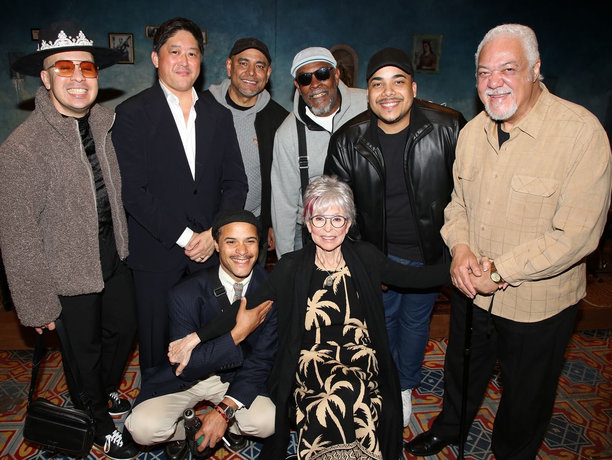 NEW YORK, NEW YORK - MAY 21: T-Bone Burnett poses with the band backstage at the new musical "Buena Vista Social Club" on Broadway at The Schoenfeld Theatre on May 21, 2025 in New York City.  (Photo by Bruce Glikas/WireImage)