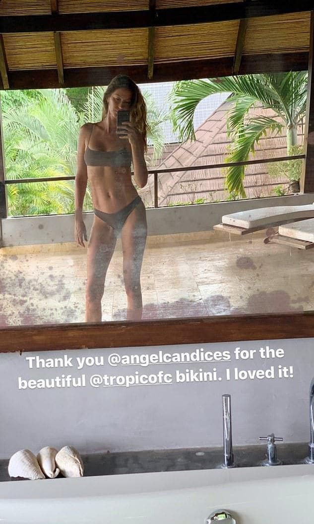 Gisele rocks two piece suit