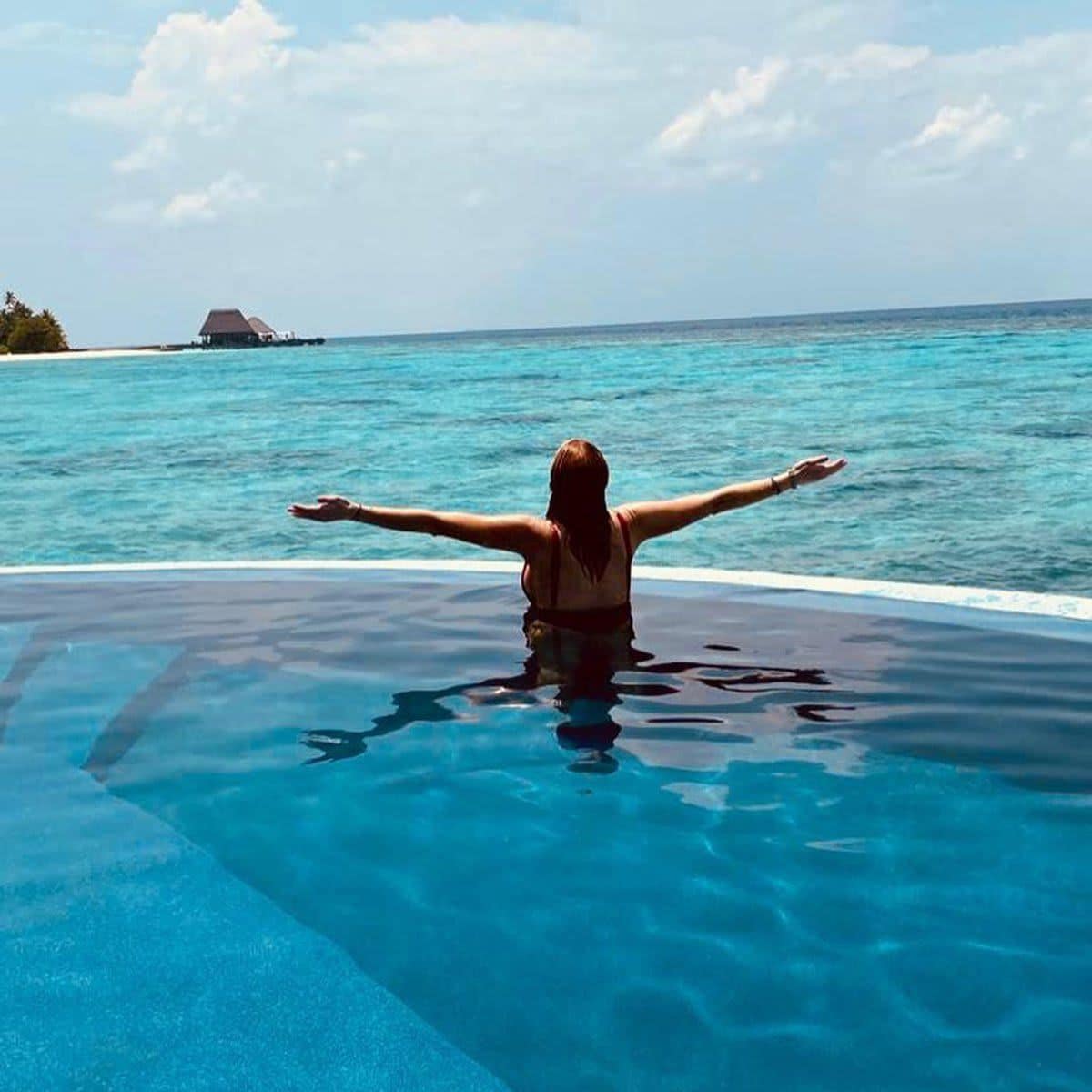 Lindsay Lohan bares it all during a trip to the Maldives