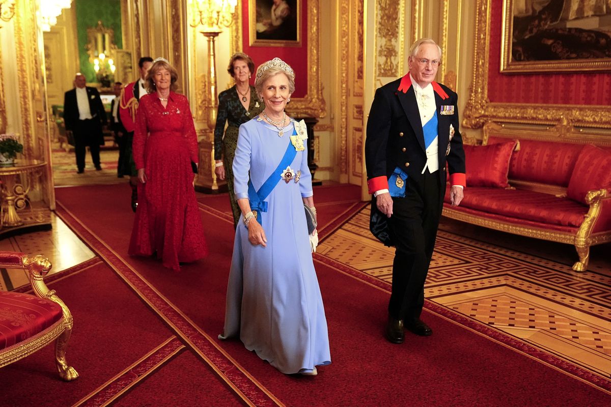 Duchess of Gloucester and Prince Richard, Duke of Gloucester walk to attend the State Banquet at Windsor Castle 