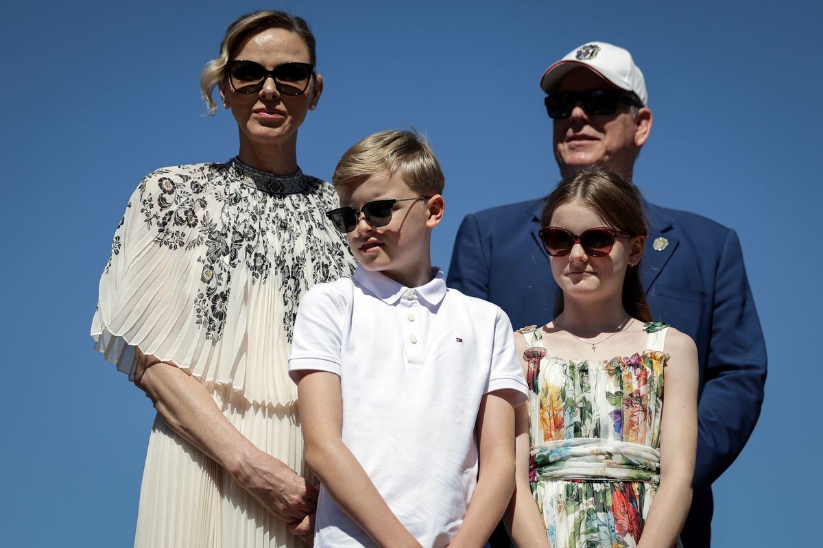 Prince Albert II of Monaco (R), his wife Princess Charlene of Monaco (L), and their children Gabriella and Jacques, look on as they arrive for a visit to Carladez, a former possession of the Principality of Monaco, in Mur-de-Barrez, southern France on July 9, 2025. (Photo by Valentine CHAPUIS / AFP) / NO TABLOIDS WEB & PRINT, NO DAILY MAIL, NO DAILY MAIL GROUP, NO VOICI, NO CLOSER (Photo by VALENTINE CHAPUIS/AFP via Getty Images)          