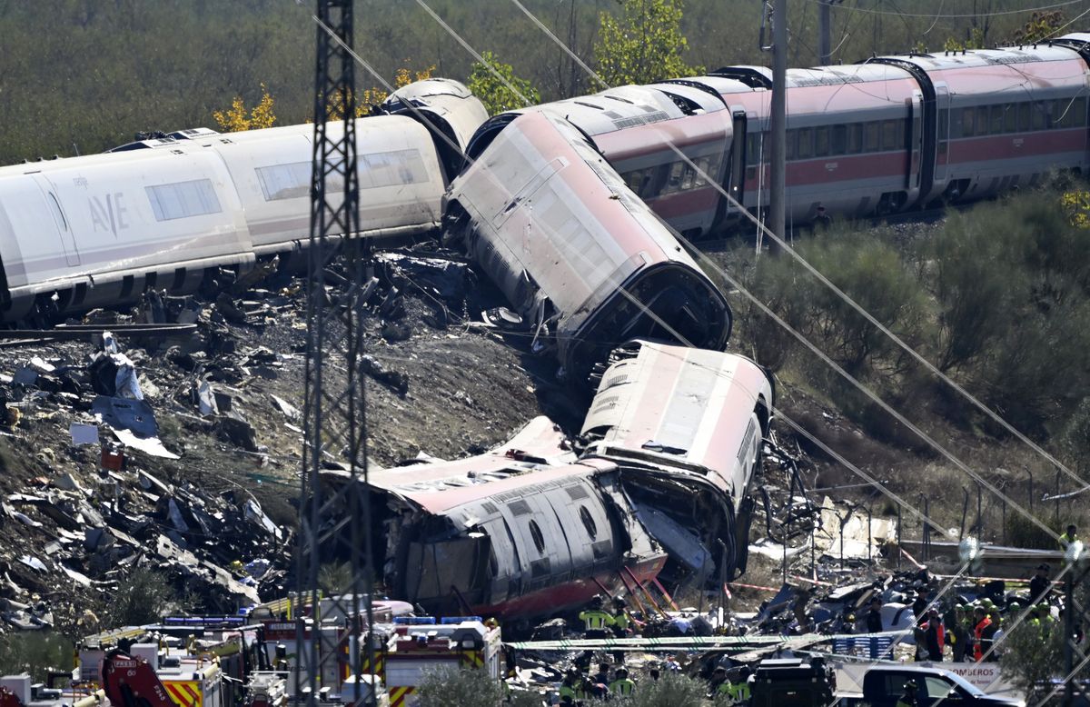 Emergency teams work at the scene of a collision involving two high-speed trains near Urda station in Toledo province, Spain, on October 28, 2026.