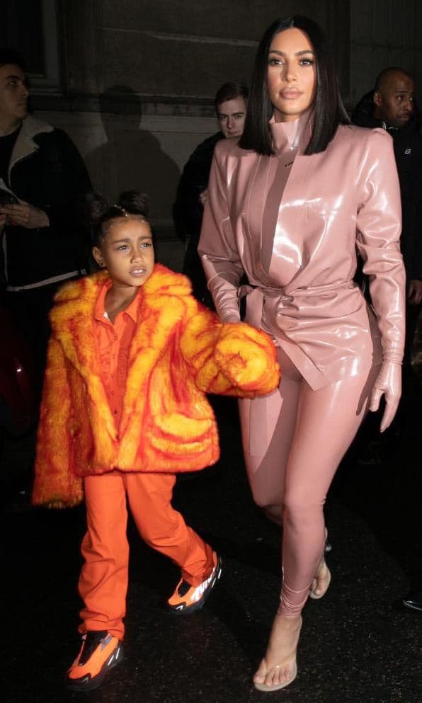 Kim Kardashian in latex with North West