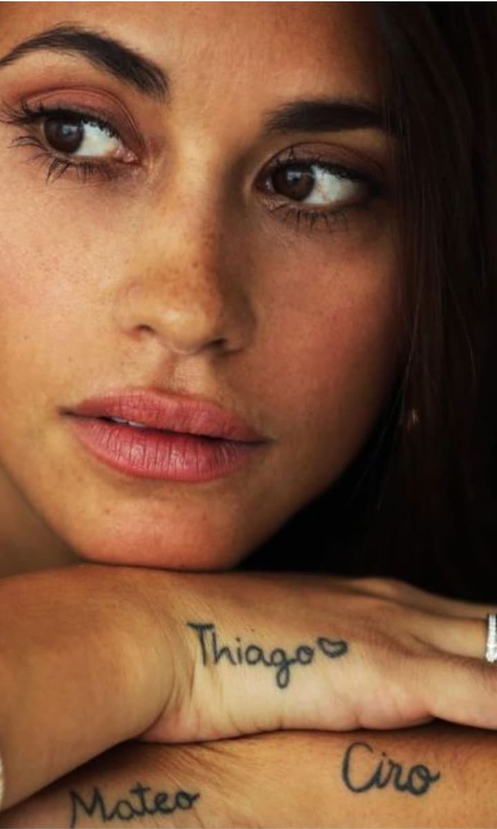 Antonela's hand tattoos