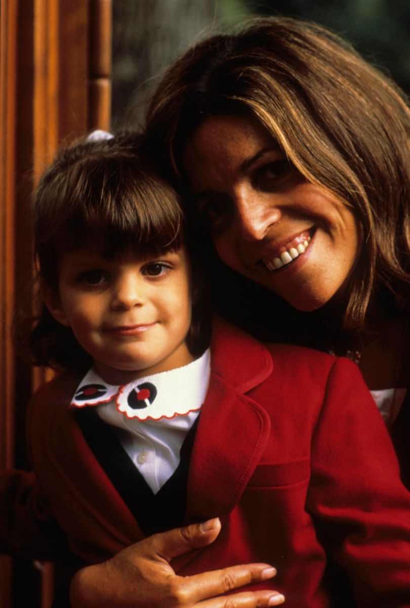 Christina Onassis, daughter of Greek shipping magnate Aristotle Onassis, is pictured with her young daughter, Athina, during an outing at the Bois de Boulogne in Paris, France.