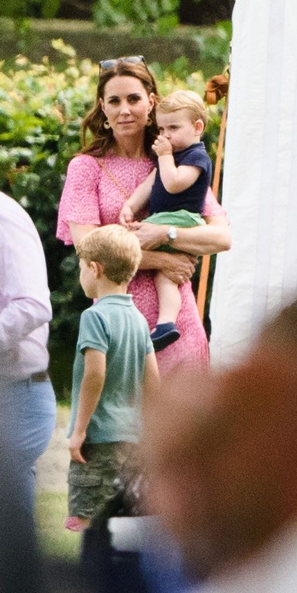 Cheeky Prince Louis wears mom Kates sunglasses and sucks thumb at first polo match