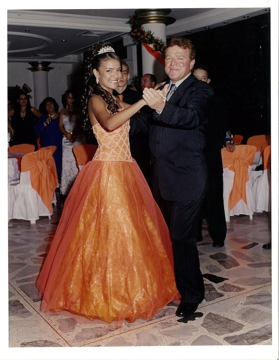 She beamed with her dad during the father-daughter dance