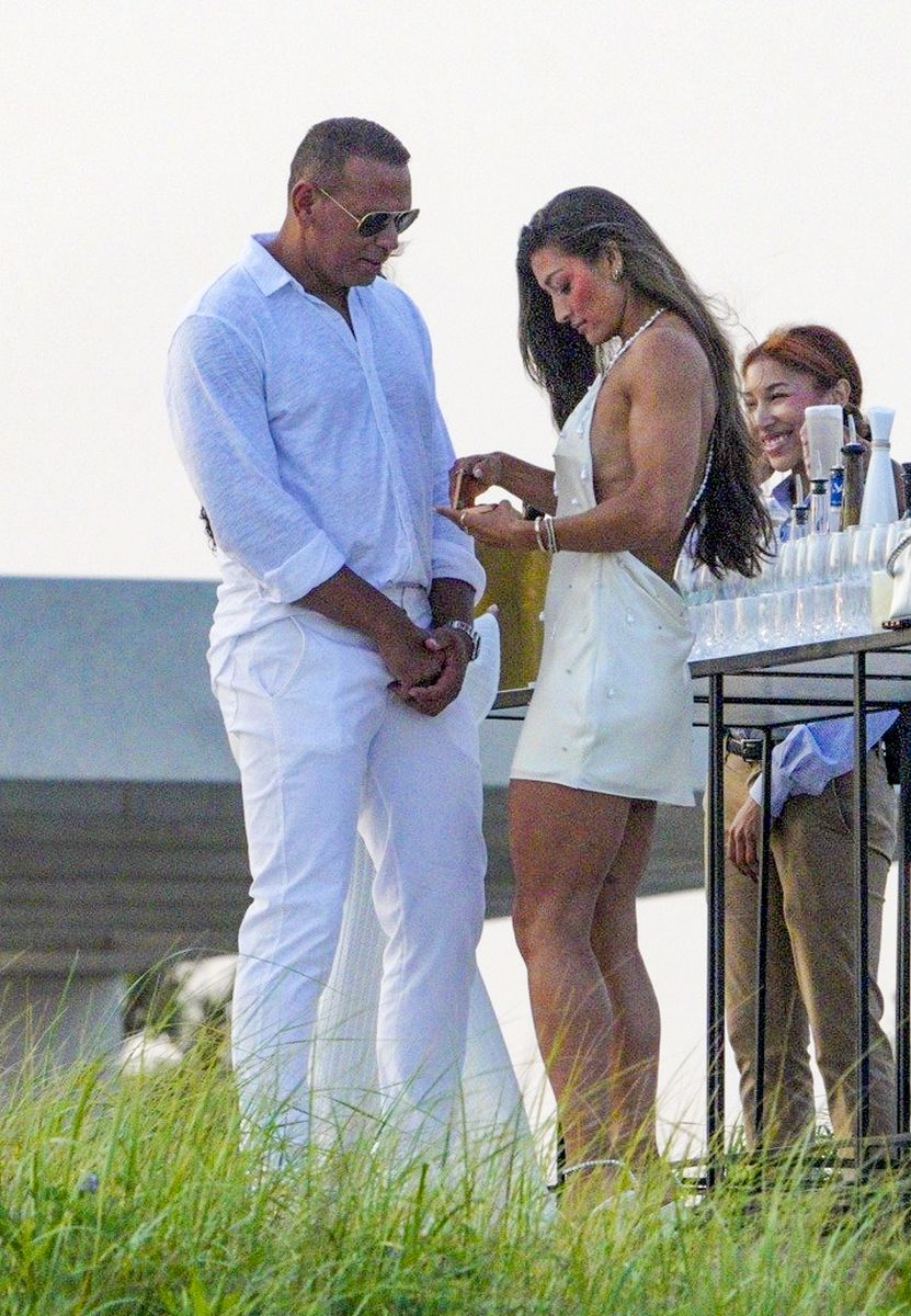 Alex Rodriguez spotted kissing mystery brunette at Michael Rubin's White Party weeks after split from Jaclyn Cordeiro