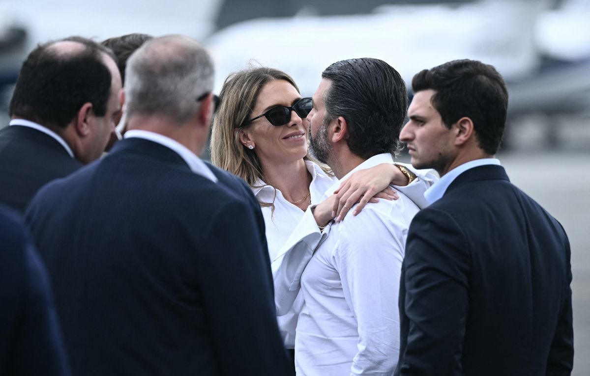Donald Trump Jr. gets a hug from his girlfriend Bettina Anderson next to his brother-in-law Michael Boulos and special personal senior counsel to the president Boris Epshteyn. 
