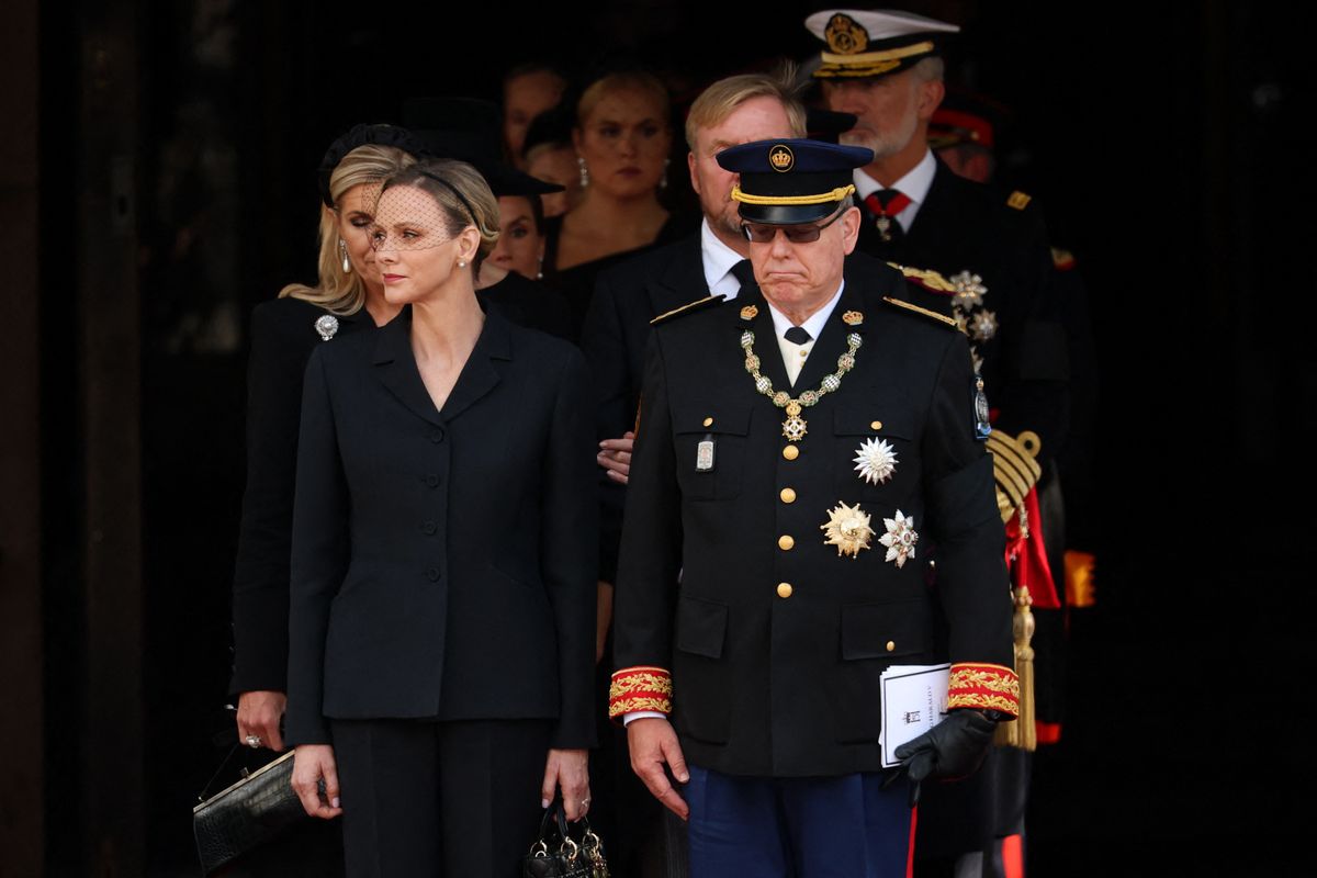 Princess Charlene stood out from the other royal women in a tailored black pantsuit for King Harald V’s funeral.