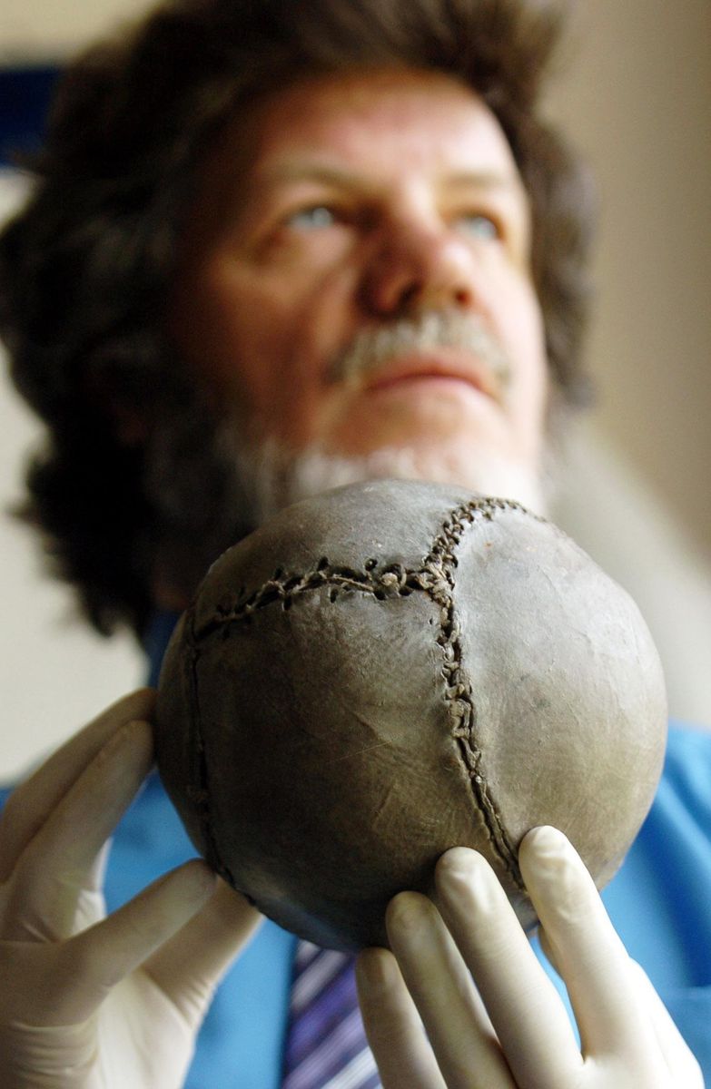Michael McGinnes, curator at the Stirling Smith Art Gallery and Museum holds the oldest known football in the world.
