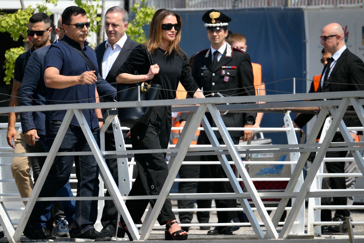 Jordan's Queen Rania prepares to board a taxi boat after landing at Venice Marco Polo airport ahead of Jeff Bezos' wedding on June 26, 2025. Celebrities in superyachts sail into Venice this week for the three-day wedding party of Amazon tycoon Jeff Bezos and Lauren Sanchez, despite irate locals who say the UNESCO city is no billionaire's playground. The tech magnate and journalist have reportedly invited about 200 guests to their multi-million dollar nuptials in the Italian city, which are expected to kick off on June 26 and end Saturday with a ceremony at a secret location. (Photo by Marco BERTORELLO / AFP) (Photo by MARCO BERTORELLO/AFP via Getty Images)          