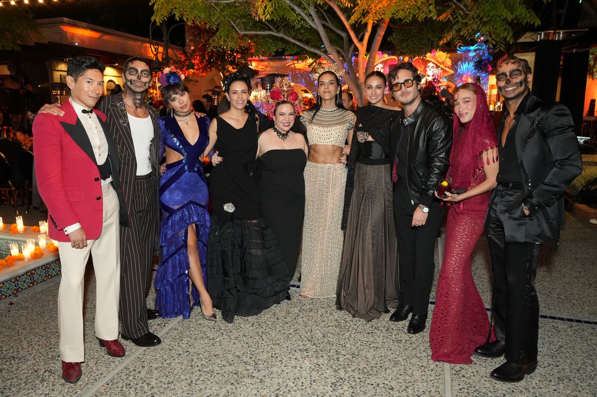 LOS ANGELES, CALIFORNIA - OCTOBER 30: (L-R) Carlos Eric Lopez, Taylor Zakhar Perez, Xochitl Gomez, Olga Segura, Gloria Calderón Kellett, Elsa Collins, Renata Notni, Diego Boneta, Nezza  and Michael Cimino attend the 2025 Dia De Muertos Gala presented by Lexus, Tequila Don Julio, Nike, DNERO, Calamigos Ranch and Maremoto at The Los Angeles River Center and Gardens on October 30, 2025 in Los Angeles, California.  (Photo by Gonzalo Marroquin/Getty Images for The Dia De Muertos Gala)