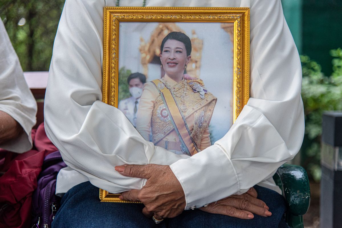 A well-wisher seen holds a portrait of Thailand's Princess Bajrakitiyabha at Chulalongkorn Hospital in Bangkok. Thailand's Princess Bajrakitiyabha was admitted to Chulalongkorn Hospital after she fell unconscious on the evening of 14 December 2022 due to heart-related symptoms