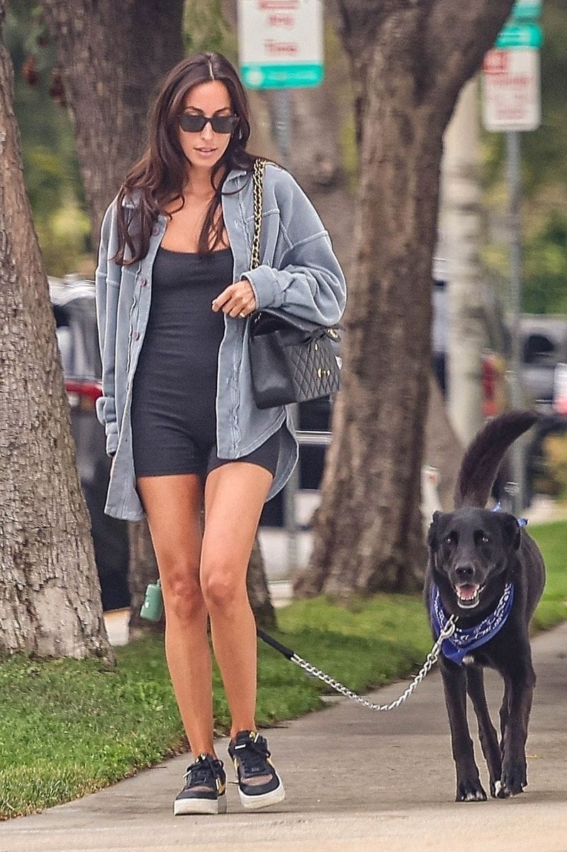 Ines De Ramon is seen walking her rescue dog Gregory in Los Angeles, wearing a tight body suit paired with a jean jacket.
