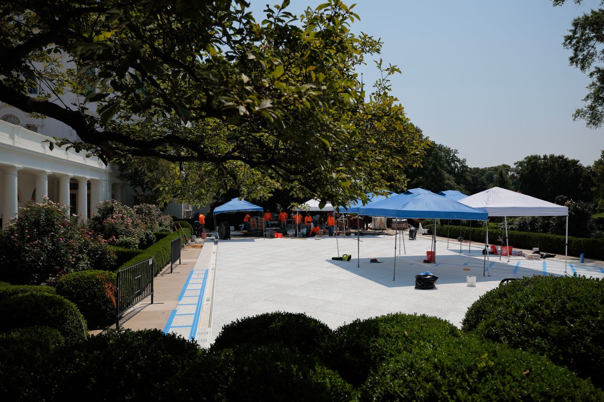 Work continues on the project to pave over the grass in the Rose Garden at the White House on July 22, 2025 in Washington, DC.
