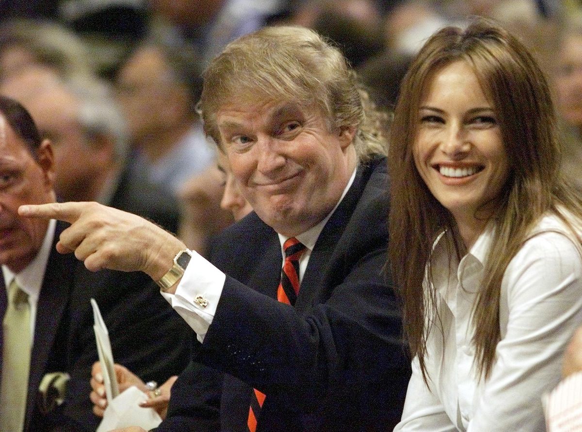 New York Knicks fan Donald Trump with Melania Knauss during the first half of the NBA Eastern Conference Finals 