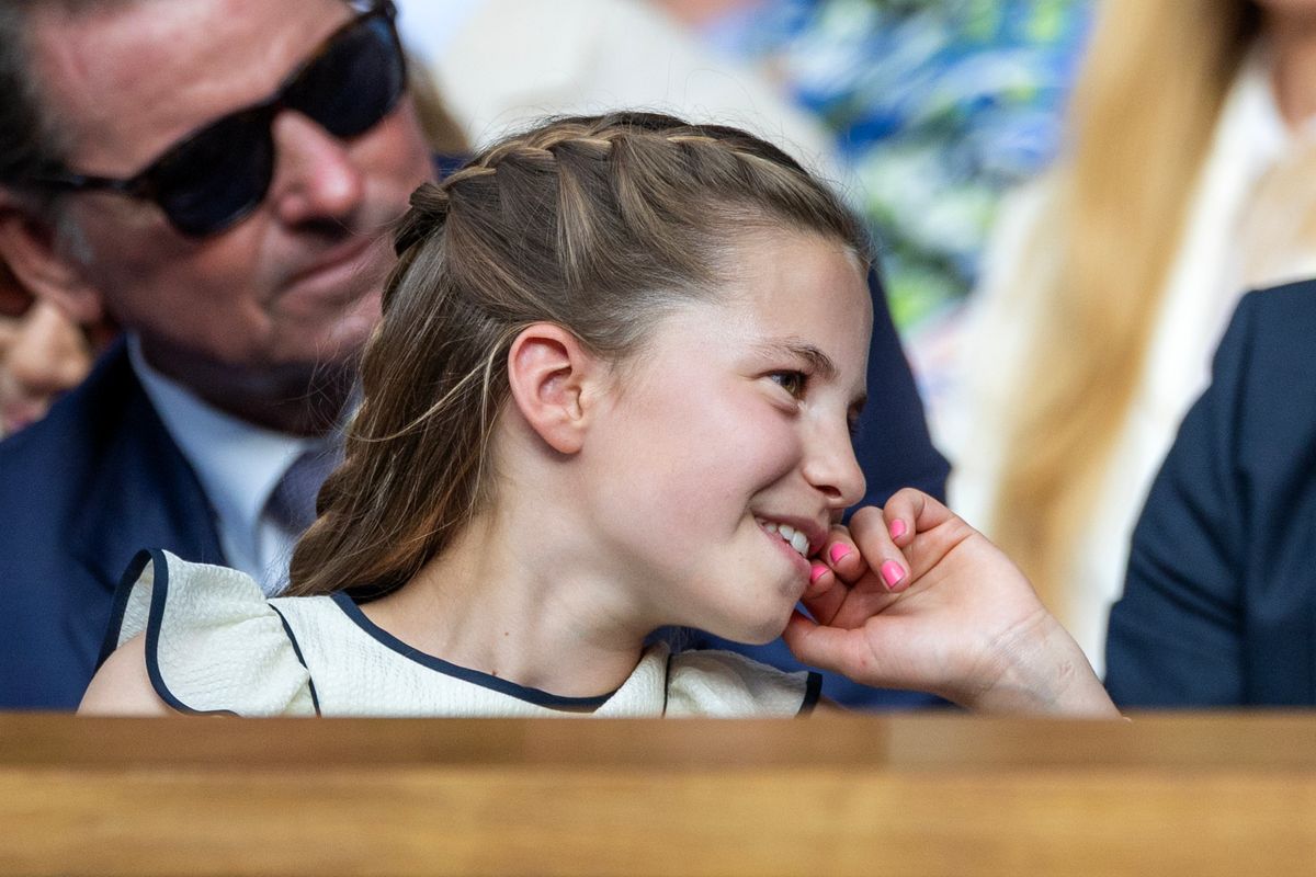 Princess Charlotte of Wales, with her finger nails painted pink on July 13th, 2025, in London, England.