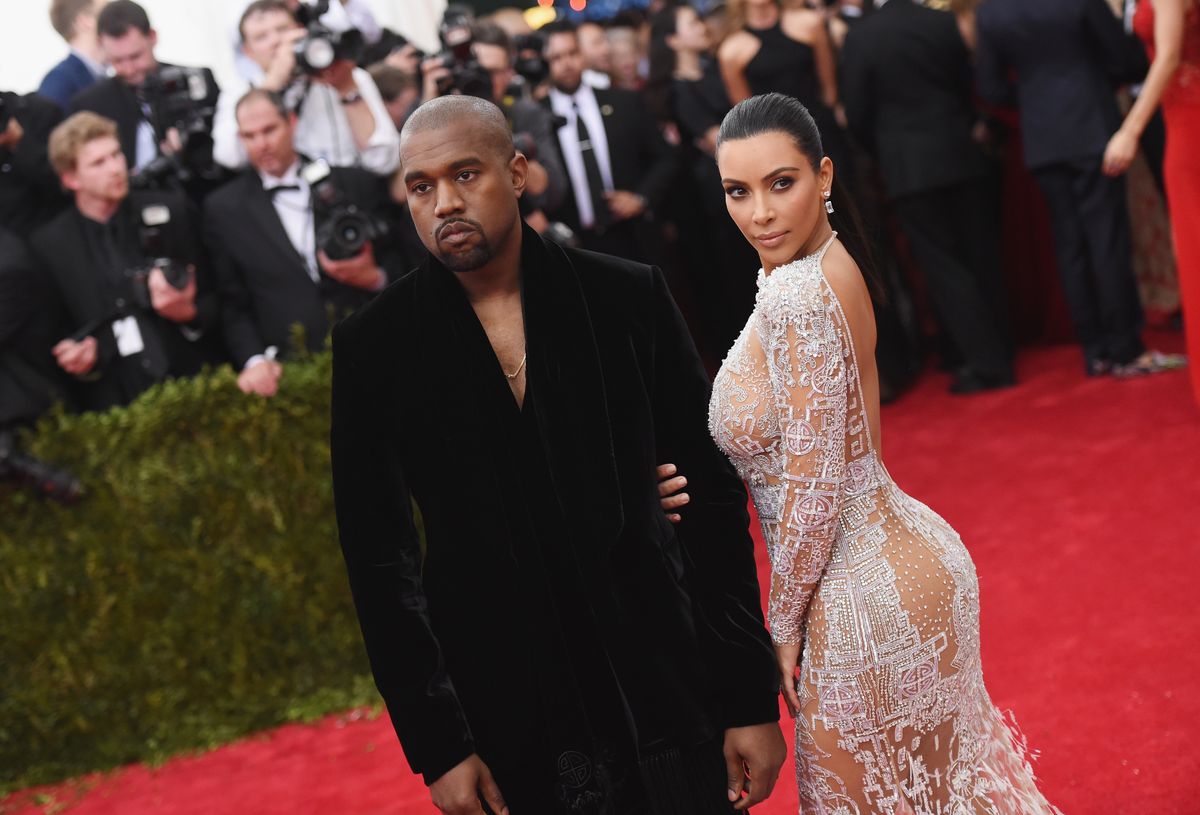 NEW YORK, NY - MAY 04:  Kanye West (L) and Kim Kardashian attend the "China: Through The Looking Glass" Costume Institute Benefit Gala at the Metropolitan Museum of Art on May 4, 2015 in New York City.  (Photo by Mike Coppola/Getty Images) 