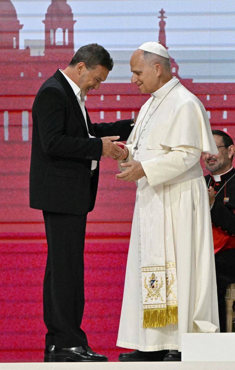 Pope Leo XIV greets Spanish actor Antonio Banderas during the meeting "Building networks with the world of Culture, Art, Economy and Sports" at the Movistar Arena in Madrid on June 7, 2026