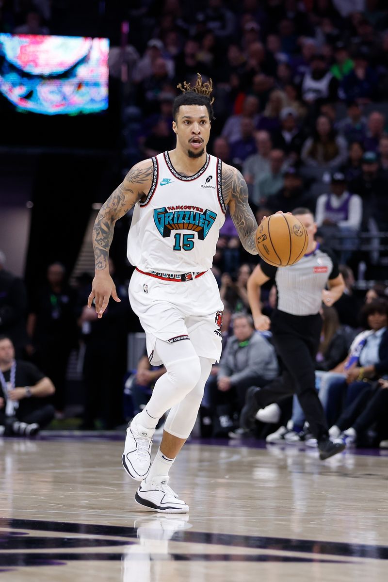  Brandon Clarke #15 of the Memphis Grizzlies dribbles the ball up court in the third quarter against the Sacramento Kings.