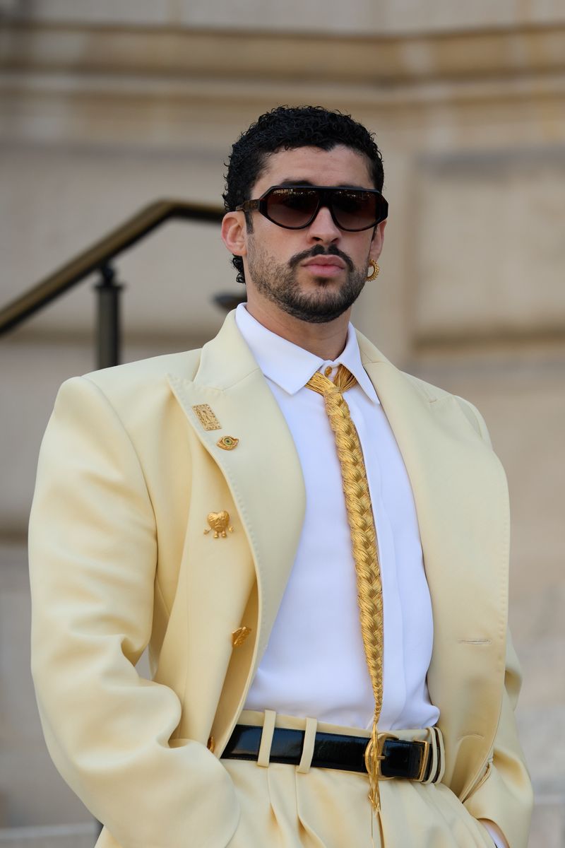The gold braided tie, a growing signature detail during Roseberry's tenure at the French fashion house.