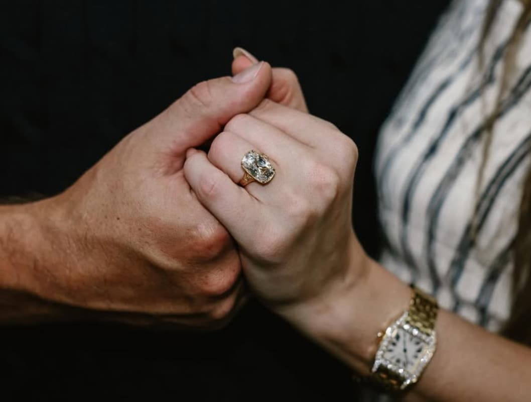 Taylor shared photos of their romantic photoshoot, including a close-up of the stunning engagement ring.
