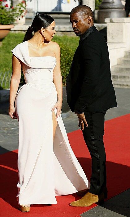 A night at the opera: Kim donned a goddess-like one shouldered gown for the 'La Traviata' Premiere at Teatro Dell'Opera in Rome, Italy, and her famous date stuck to his signature tux and brown suede boots combination.
<br>
Photo: Getty Images