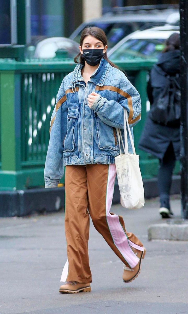 Suri Cruise with an oversized jean jacket