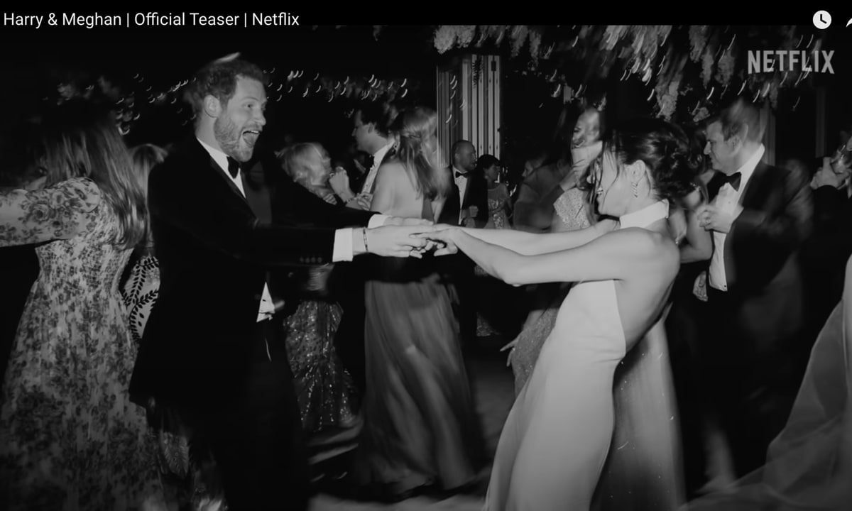 A never before seen photo from Meghan and Harry's wedding reception appears to be in the teaser