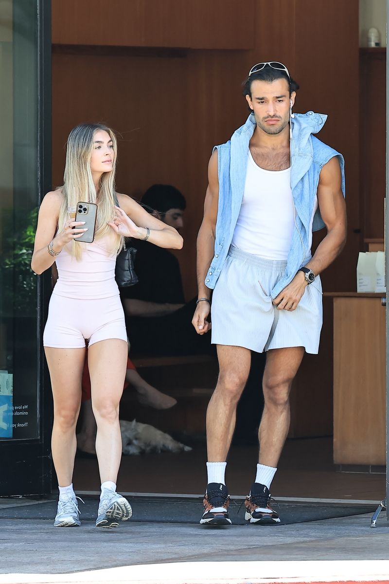 Sam Asghari and his girlfriend Brooke Irvine were spotted enjoying a sunny day in Beverly Hills after stopping by a local café.