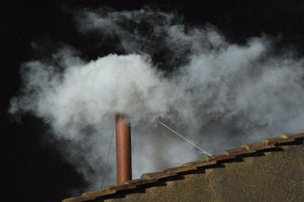 White smoke rising from the chimney on the roof of the Sistine Chapel will indicate the election of a new Pope.