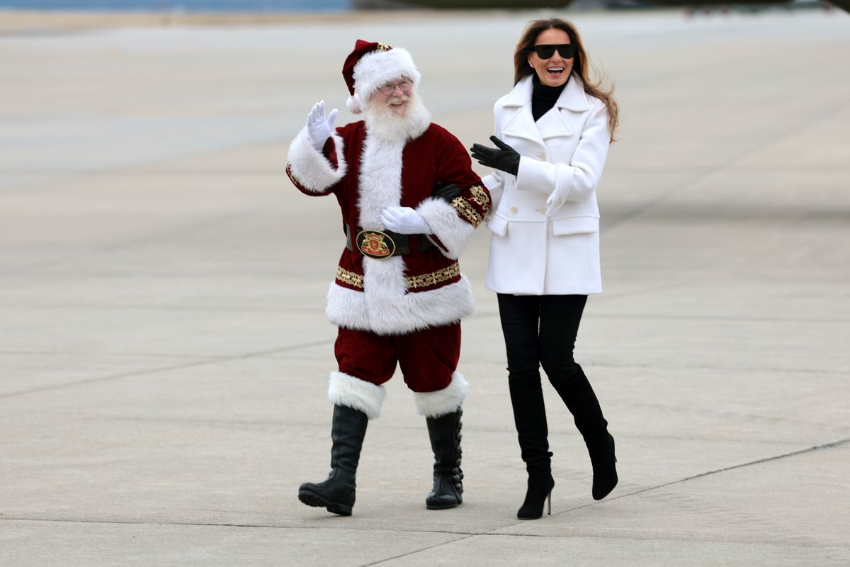 First lady Melania Trump and Santa arrive at Marine Corps Base Quantico on December 08, 2025 