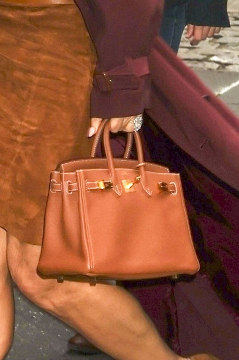 Lauren Sanchez showcasing her stunning diamond ring paired with another of her luxury bags 