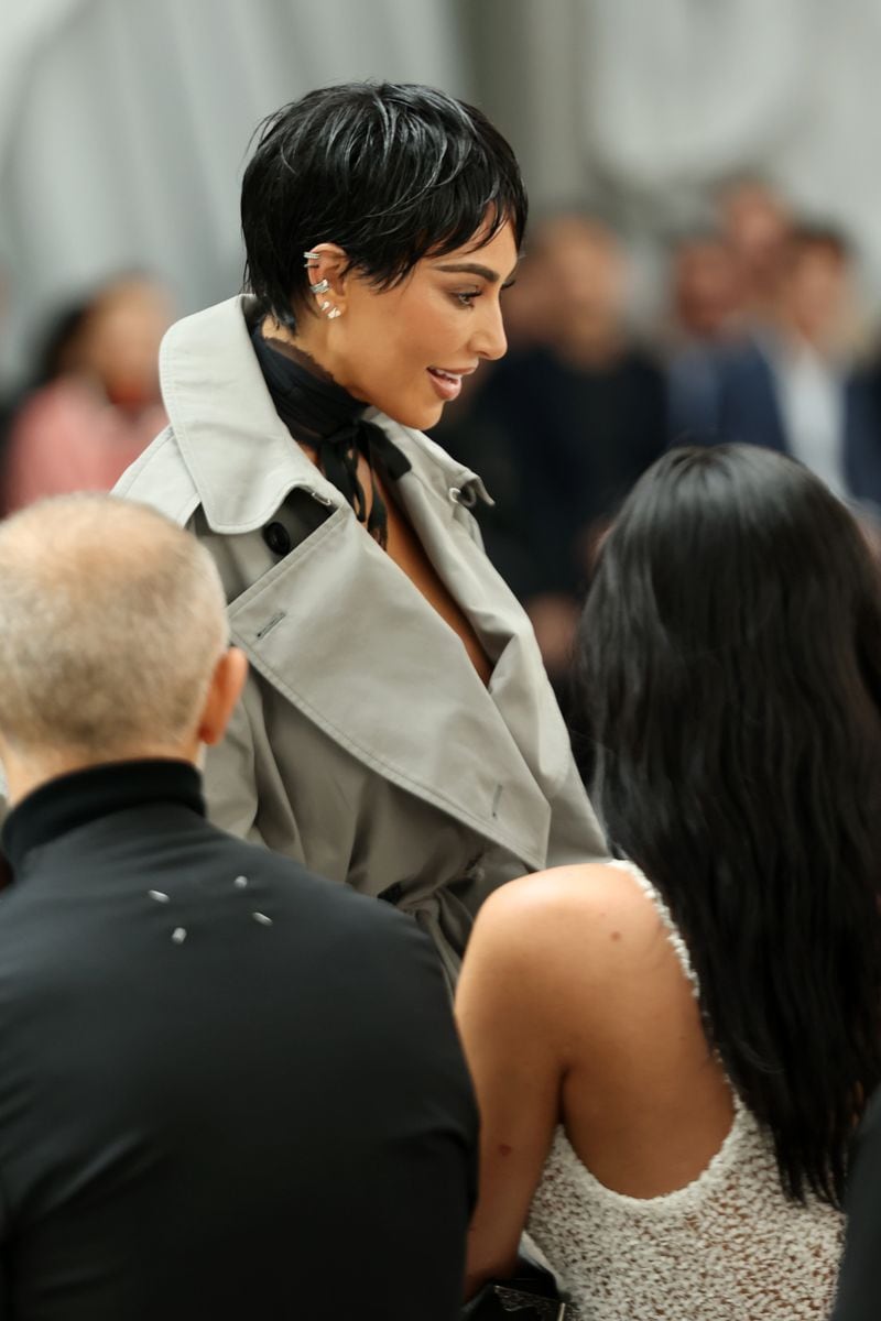 Her short dark locks were styled with extra shine and texture.