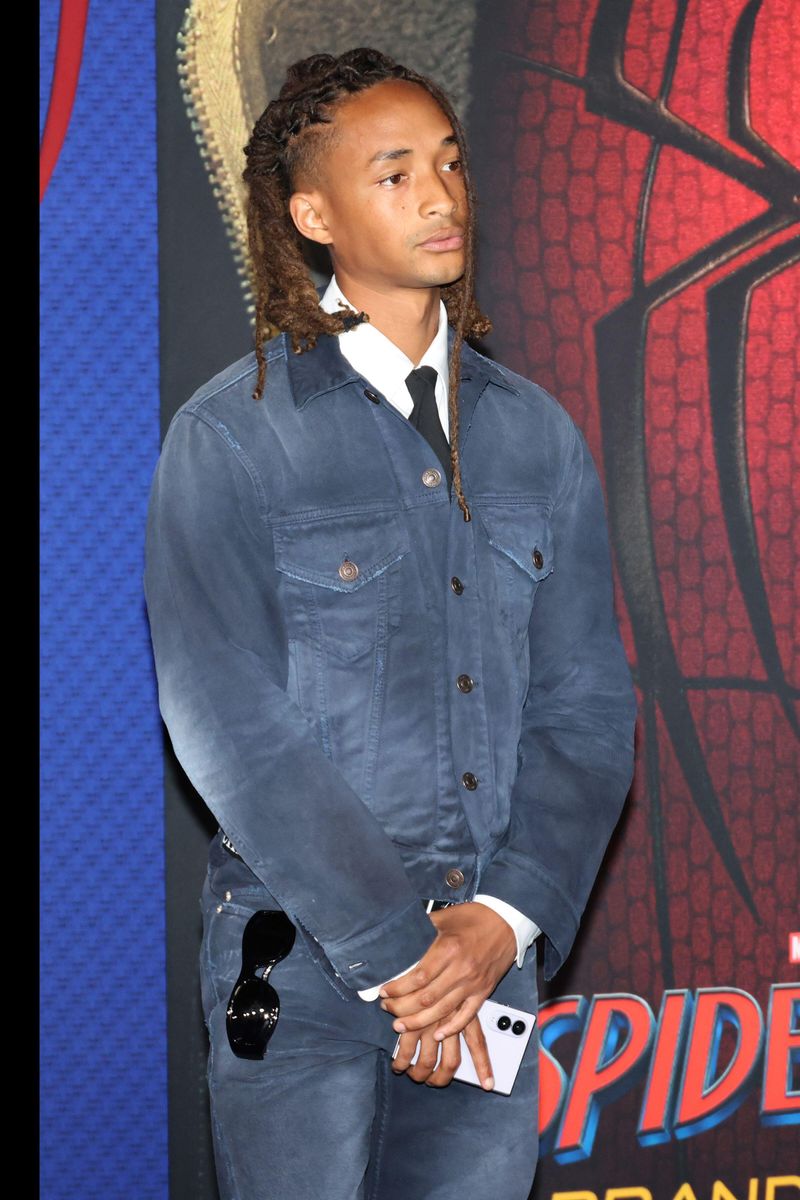 Jaden Smith showed off a surprisingly understated double-denim look while attending the Los Angeles premiere of Spider-Man: Brand New Day with his older brother, Trey Smith.