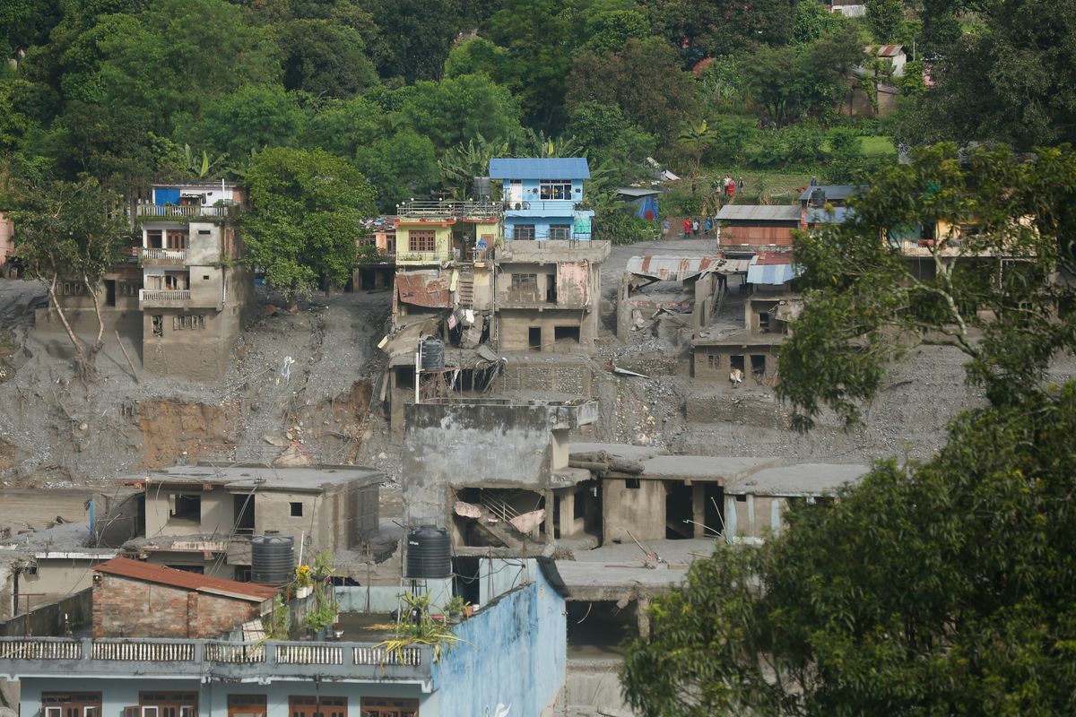 Rescue teams and local residents navigated difficult conditions as the search for missing people continued.