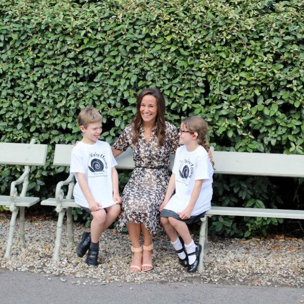 Pippa shared a laugh with students during her visit to the school, which offer education to deaf children.
Photo: Twitter/@maryhareschool